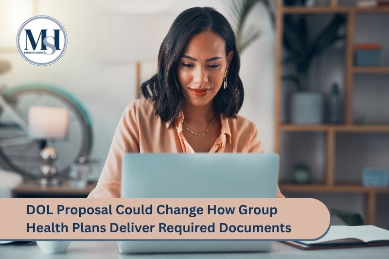 Employee checking email. DOL Proposal Could Change How Group Health Plans Deliver Required Documents.